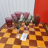 All ten acrylic glasses on chessboard top