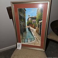 Front view of framed artwork on chair