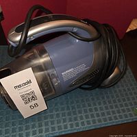 Side view showing Purpose for Pets branding and power cord