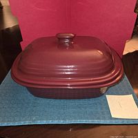 Cranberry stoneware baker with lid, front view