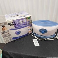 ParaSpa Mini unit beside original box