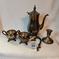 Group shot of all four silver plated pieces