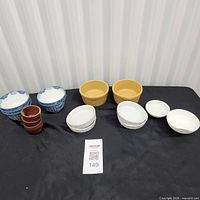 All sixteen bowls laid out