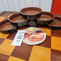 Stack of six Regas glazed terra cotta ramekins