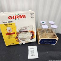 Girmi yogurt maker retail box, Sur La Table milk glasses set beside it