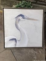 Front view of framed heron canvas