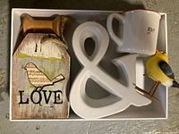 Tray view showing all four items: mug, bird plaque, ampersand, bird figurine