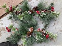 Full view of both Christmas pine swags