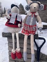 Both plush shelf sitters showing full bodies and outfits