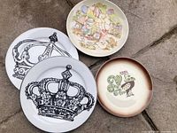 All four decorative side plates arranged on ground