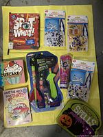 Lot overview showing all nine items on yellow background
