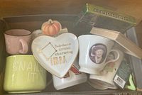 Box containing mugs, Libra plate, Cosmos game, wood signs, assorted items