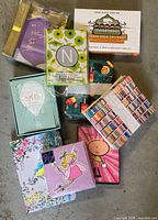 Group shot of all boxed stationery, journal and poker game set