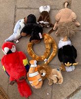 overview of nine plush animals laid out