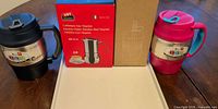 Group shot: Vev Vigano espresso maker box, Nespresso tumbler box, two Bubba mugs