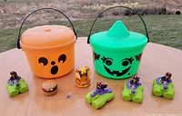 Overview of both Boo Buckets and all toys on table