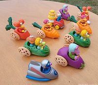 Group shot of all ten racers on table