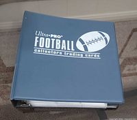 Blue Ultra PRO football trading card binder closed
