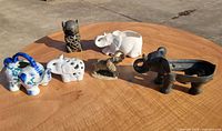 All six elephant themed items on table