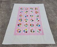 Full view of quilt showing design and border