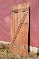 Front view showing Z-brace board-and-batten design