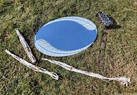 Group shot: mirror, three macramé plant hangers, metal candle lamp