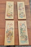 All four Coby frog plaques laid out