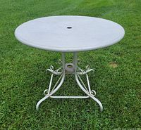 Full view of table on grass