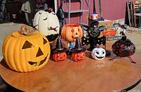 All eight Halloween décor pieces on table