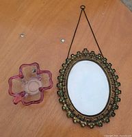 Ashtray and mirror together on tabletop