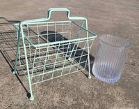 Both items together: wire magazine rack and glass wastebasket