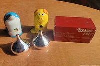 Group shot showing both Silver Kiss shakers, both wooden sharpeners and original Jonal box