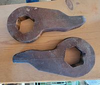 Two metal torsion keys top view showing overall shape and hexagonal opening