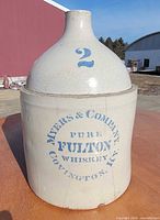 Front view showing stencil text and "2" mark