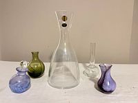 Group shot showing all five glass vases