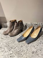 Both pairs of footwear side by side