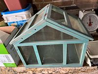 Front and side view of mini greenhouse