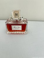 Front view of Miss Dior perfume bottle showing label and fill level