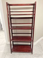 Front view showing four shelves and frame