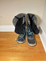 Front view showing overall appearance, blue laces, cuff lining