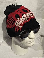 Toque on mannequin head showing front logo