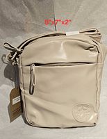 Front view showing size overlay, front zip pocket, Converse patch