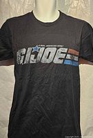 Front view of black G.I. Joe T-shirt displayed on mannequin