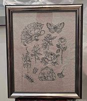 Full view of one framed tattoo flash drawing showing frame and artwork