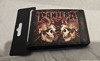 Front of wallet showing Pantera logo and skull artwork on packaging card