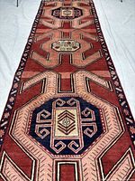 Full view of runner rug showing entire geometric pattern and border