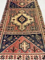 Full view of Ferdos wool rug showing overall pattern and colours