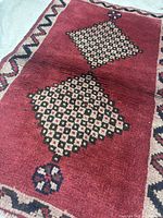 Oblique view showing central field and diamond medallions