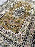 Angled close-up showing field, border and pile condition