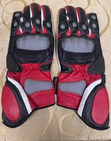 Pair of Keprotec gauntlet racing gloves palm side up